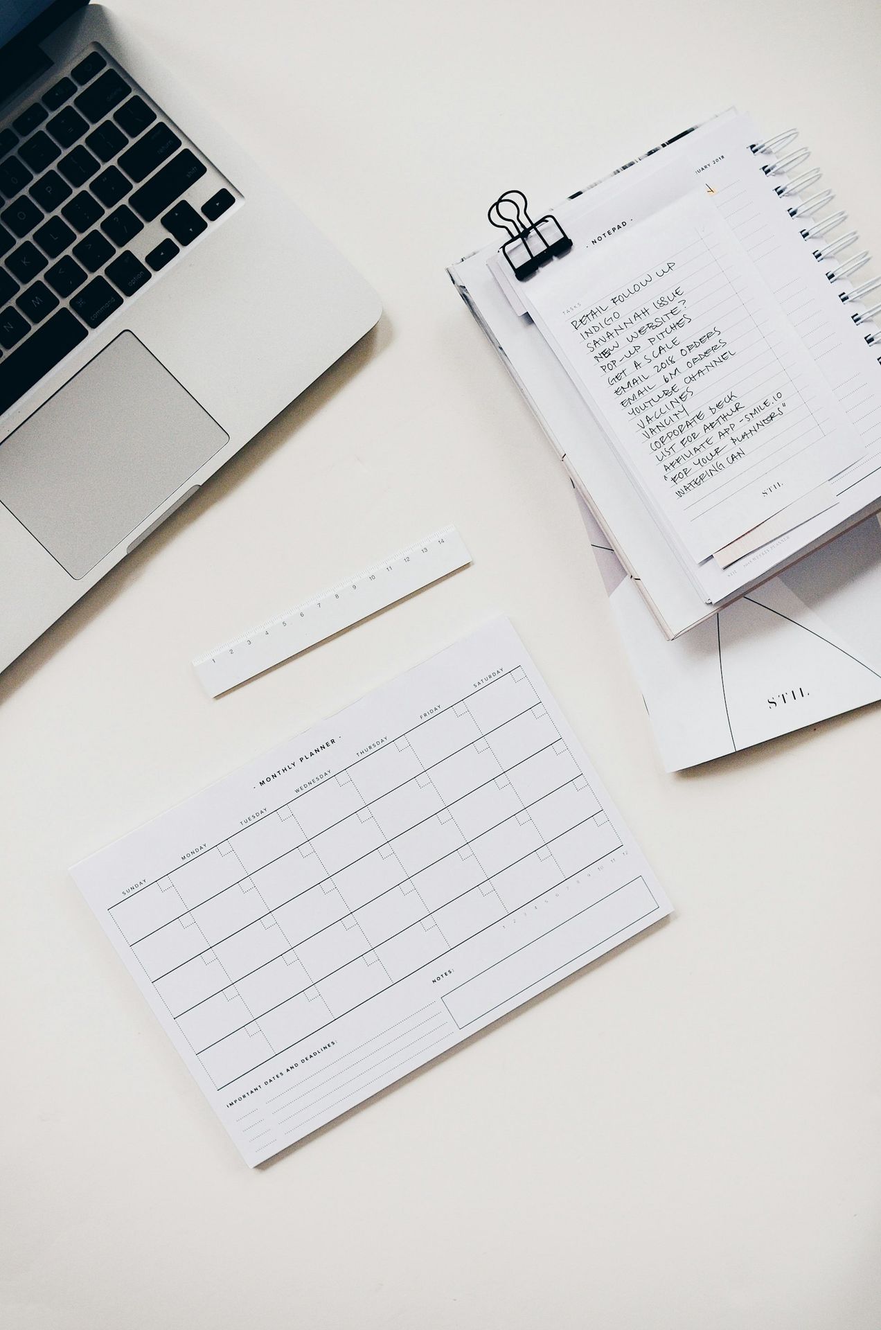 Desk with financial charts and a calculator
